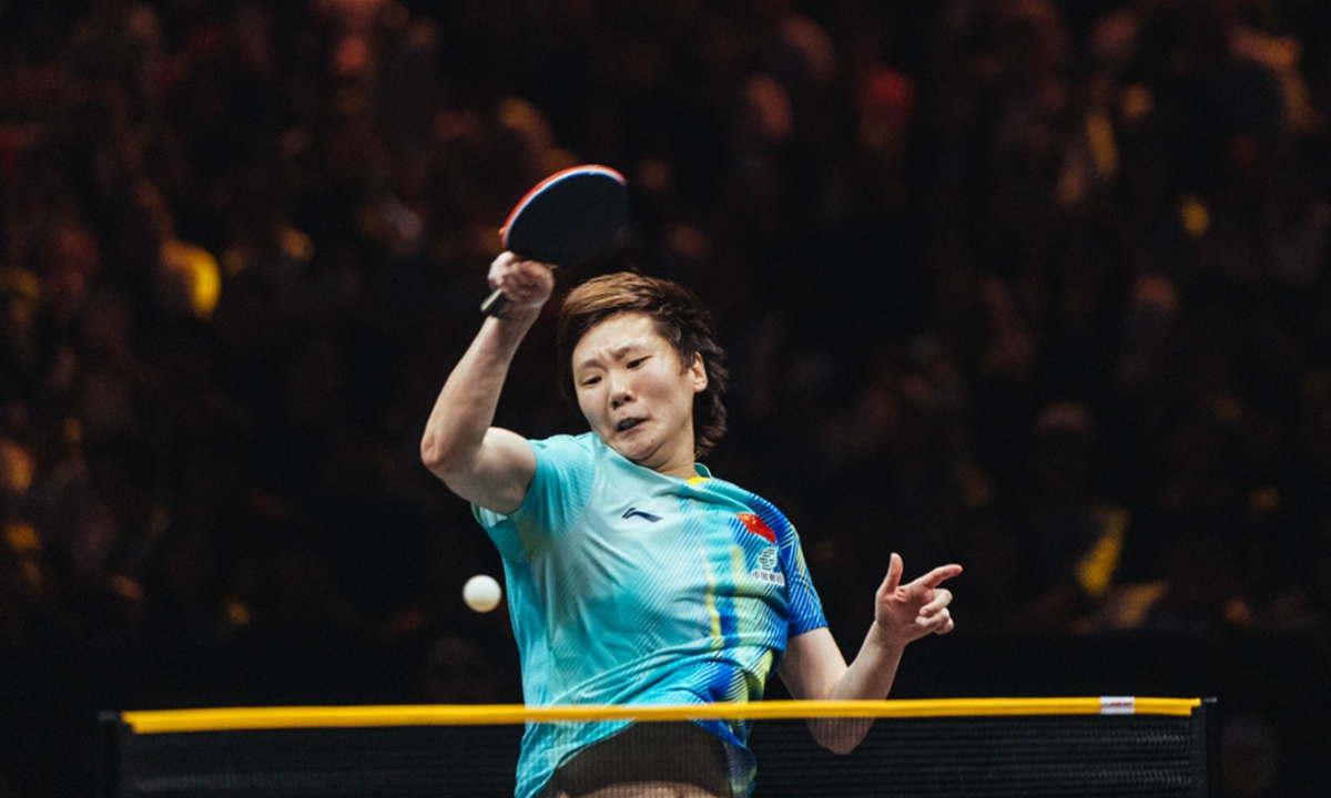 Chinese table tennis player Wang Manyu hits a return to Japan's Hitomi Sato at the 2026 WTT China Smash final in Beijing on October 11, 2026. Wang successfully defended her women's singles title after defeating Sato 4-0. Photo: Li Hao/Global Times