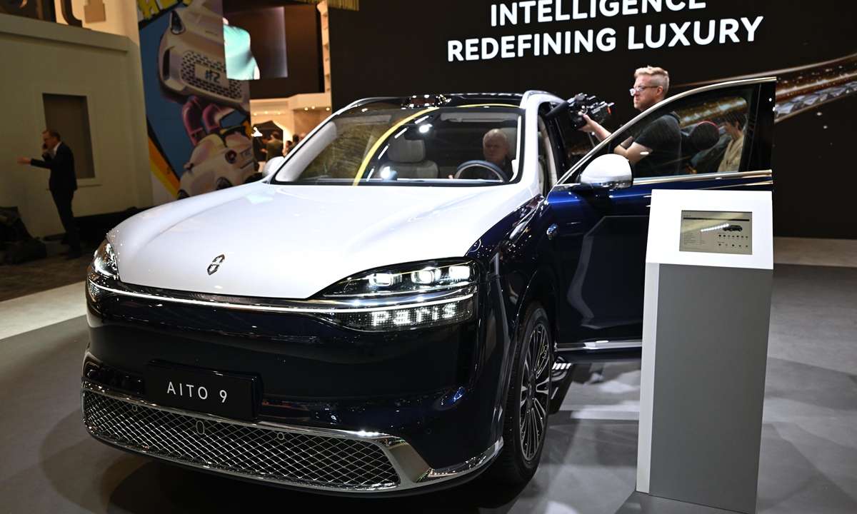 An Aito 9 SUV electric vehicle with programmable LED lighting reading Paris on the opening day of the Paris Motor Show in Paris, France, on Monday, Oct. 12, 2026. Photo: VCG