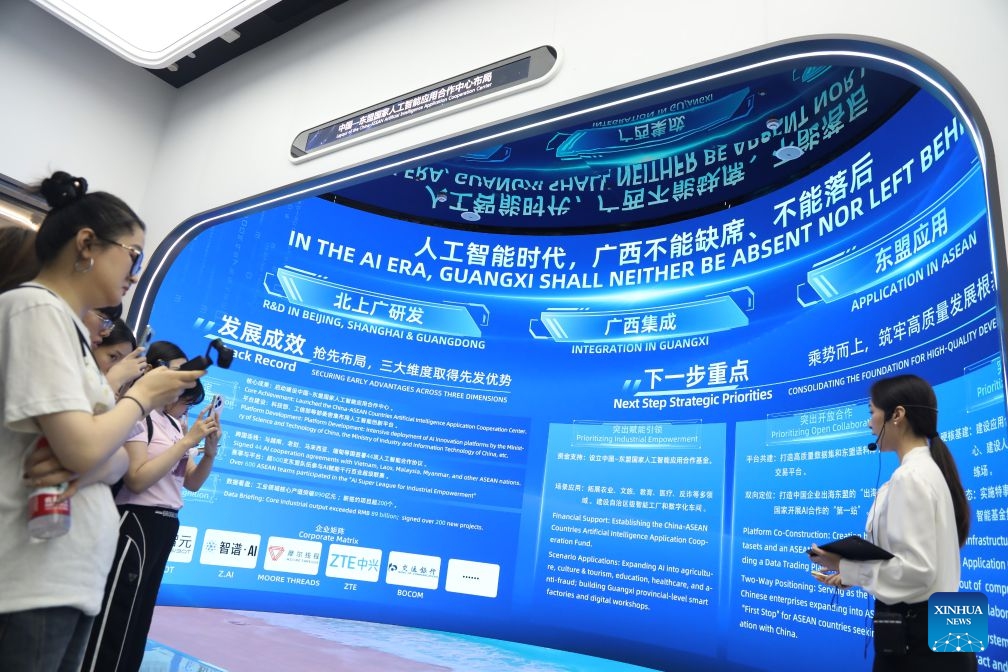 Media professionals visit the China-ASEAN Countries Artificial Intelligence (AI) Application Cooperation Center in Nanning, south China's Guangxi Zhuang Autonomous Region, Oct. 12, 2026. Located in Nanning City, the China-ASEAN Countries Artificial Intelligence (AI) Application Cooperation Center serves as an important platform for south China's Guangxi Zhuang Autonomous Region to implement the national AI development strategy and deepen China-ASEAN cooperation in AI. (Photo: Xinhua)