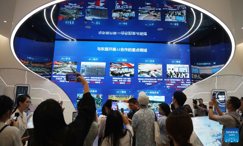 Media professionals visit the China-ASEAN Countries Artificial Intelligence (AI) Application Cooperation Center in Nanning, south China's Guangxi Zhuang Autonomous Region, Oct. 12, 2026. Located in Nanning City, the China-ASEAN Countries Artificial Intelligence (AI) Application Cooperation Center serves as an important platform for south China's Guangxi Zhuang Autonomous Region to implement the national AI development strategy and deepen China-ASEAN cooperation in AI. (Photo: Xinhua)
