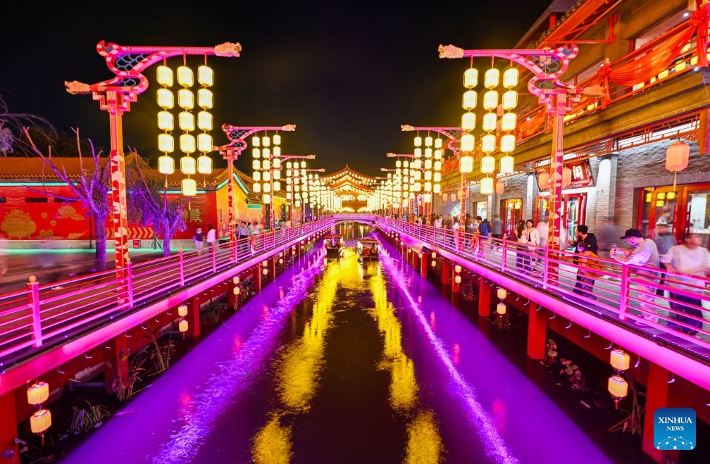 Tourists take boats for sightseeing at the Eastern Acropolis in Binhai New Area of Tianjin, north China, Oct. 11, 2026. Eastern Acropolis, a cultural and tourism complex in Beitang ancient town of Tianjin, launched its trial operation on Sunday. The complex, built upon the town's original infrastructure and themed on Tianjin's history and culture, offers immersive performances, cultural experiences, specialty stores and leisure options for visitors. (Photo: Xinhua)
