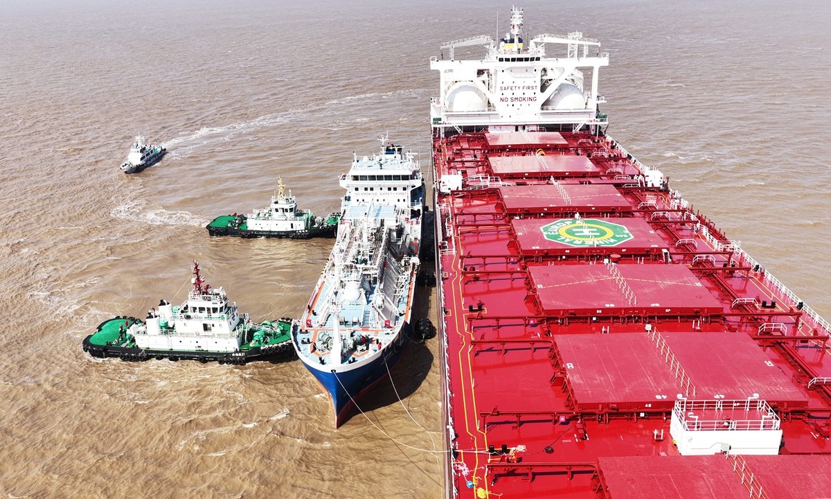 The world's first commercial ship-to-ship green ammonia bunkering operation takes place at an anchorage in Zhoushan, East China's Zhejiang Province, on October 13, 2026. Photo: Courtesy of CEEC