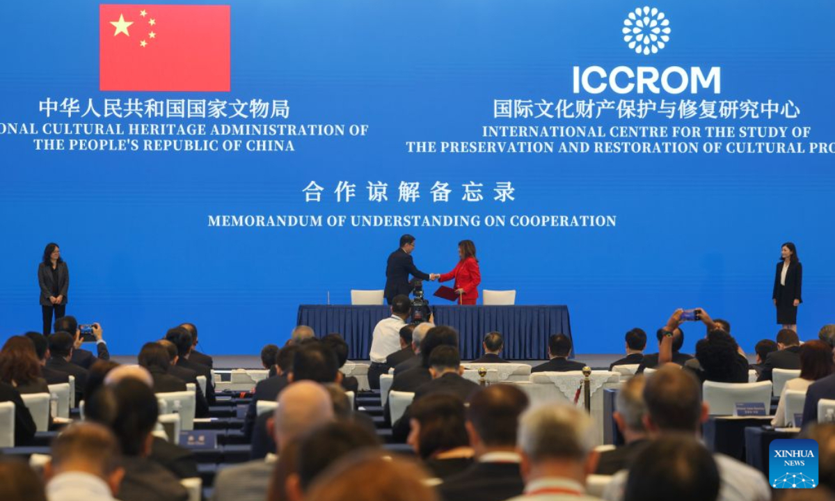 Delegates from the National Cultural Heritage Administration of China and the International Centre for the Study of the Preservation and Restoration of Cultural Property shake hands after signing a memorandum of understanding on cooperation during the opening ceremony of the fourth Liangzhu Forum in Hangzhou, east China's Zhejiang Province, Oct. 18, 2026. The fourth Liangzhu Forum opened Sunday in Hangzhou, east China's Zhejiang Province, to discuss challenges in cultural heritage conservation and paths to deepen international cooperation.
The year 2026 marks the 90th anniversary of the discovery of the Liangzhu ruins. Themed Bridging the Past and the Future: Safeguarding Cultural Heritage for Our Times, the forum brings together officials, archaeologists and scholars from around the world. (Xinhua/Xu Yu)
