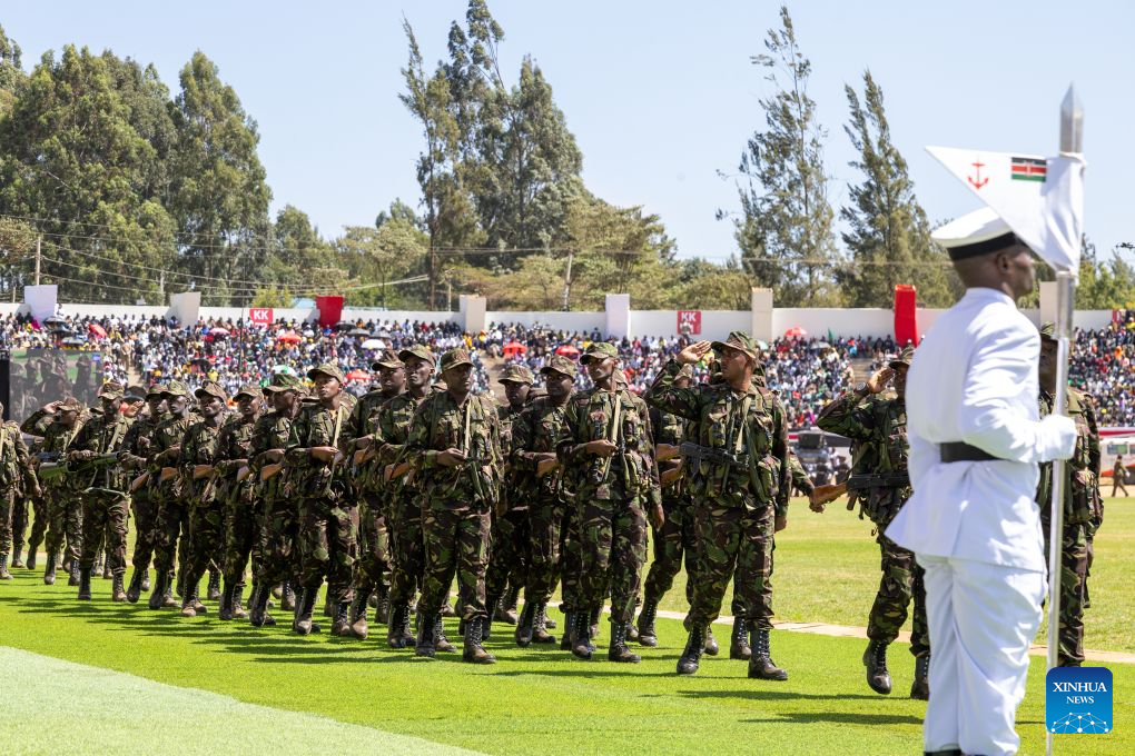 Kenyan military personnel parade during the Mashujaa Day celebrations at Kipchoge Keino Stadium in Eldoret, Kenya, on Oct. 20, 2026.
Kenya celebrated Mashujaa Day, or Heroes' Day, on Tuesday. (Photo by Kelly Ayodi/Xinhua)