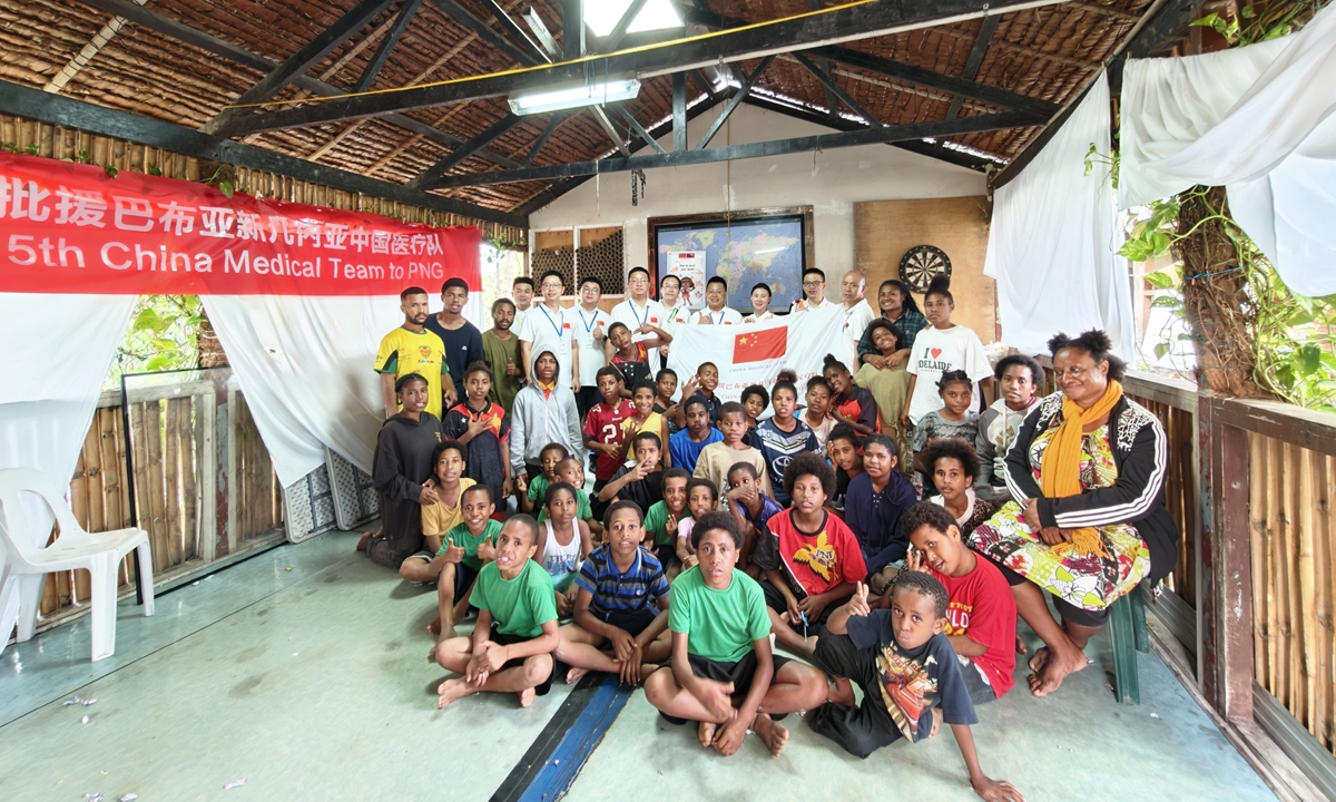 Members of the Chinese medical team provide health checks, hygiene education and donate supplies for 45 children at the Life PNG Care center in Port Moresby, Papua New Guinea, on November 17, 2025.