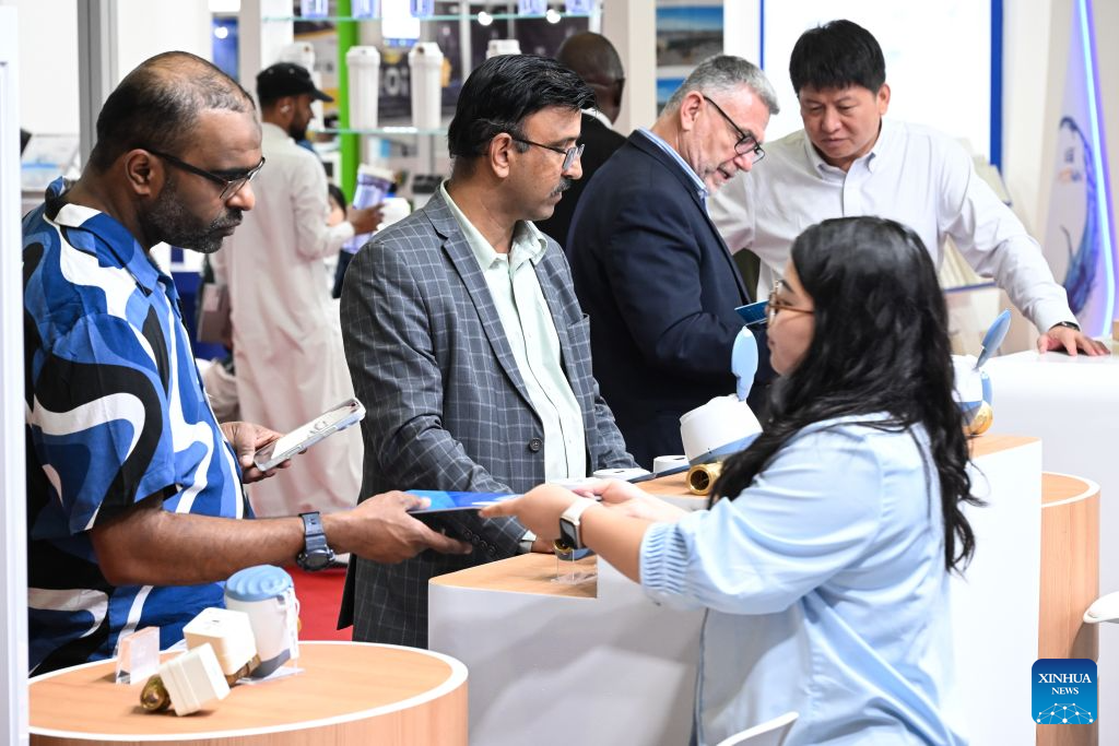 People learn about ultrasonic water meters at the booth of Shenke Technology Group from China during the 28th Water, Energy, Technology and Environment Exhibition (WETEX) in Dubai, the United Arab Emirates, Oct. 20, 2026. The 28th WETEX opened Tuesday at the Dubai World Trade Centre in Dubai. (Xinhua/Wang Zecong)
