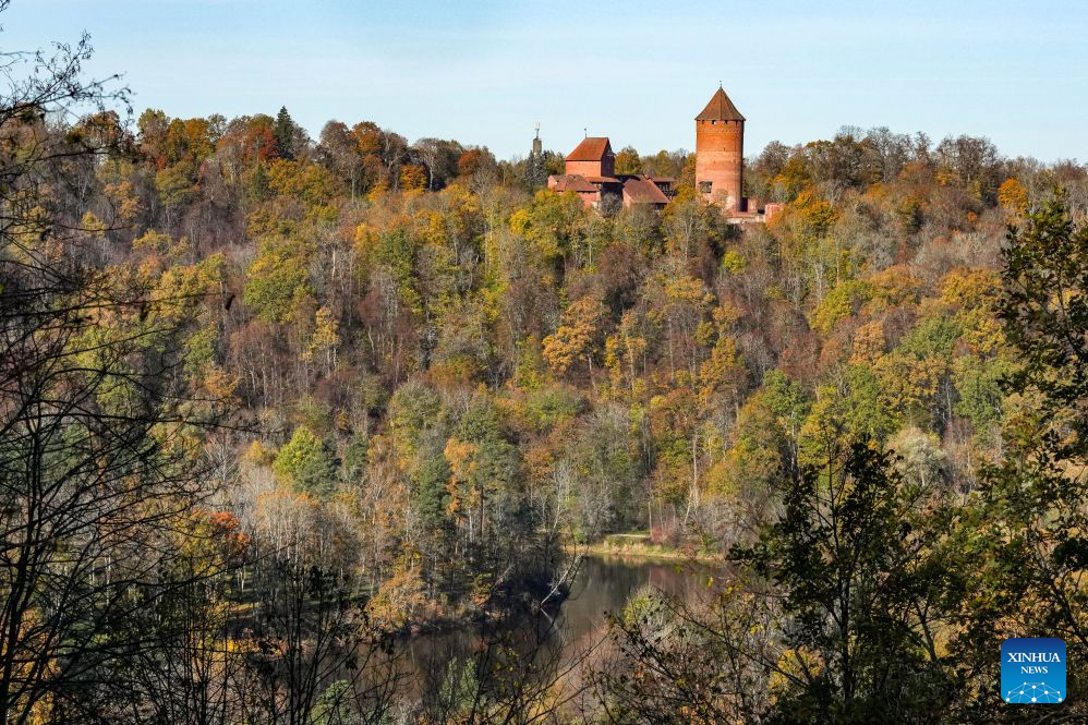 Photo taken on Oct. 19, 2026 shows the autumn scenery and Turaida castle in Sigulda, Latvia. (Photo by Edijs Palens/Xinhua)