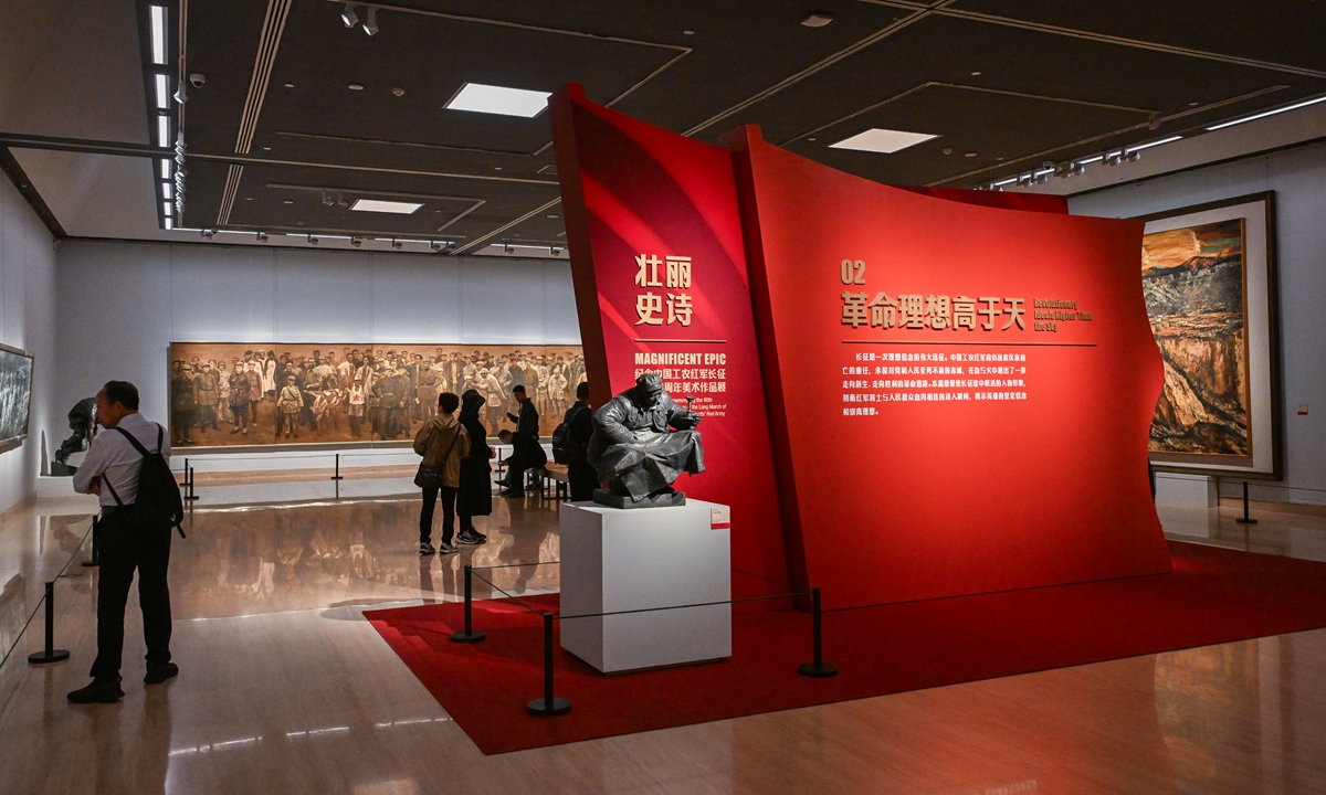 Visitors explore an art exhibition marking the 90th anniversary of the victory of the Long March at the National Art Museum of China, Beijing, on October 13, 2026. Hosted by the Ministry of Culture and Tourism and China Federation of Literary and Art Circles, the exhibition is running from September 29 to October 24, 2026. Photo: VCG
