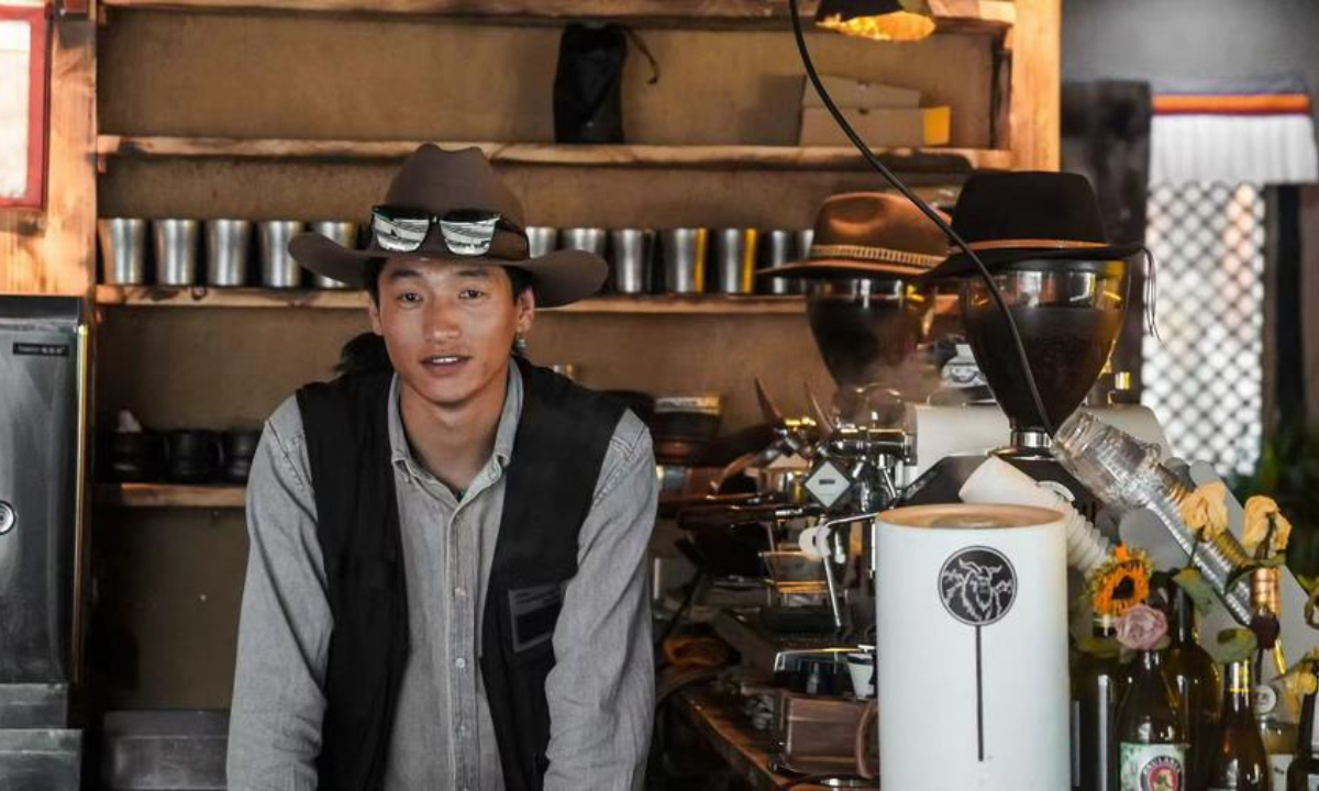 This file photo shows Gonbu at a coffee shop in Songpan County, southwest China's Sichuan Province. (Xinhua)