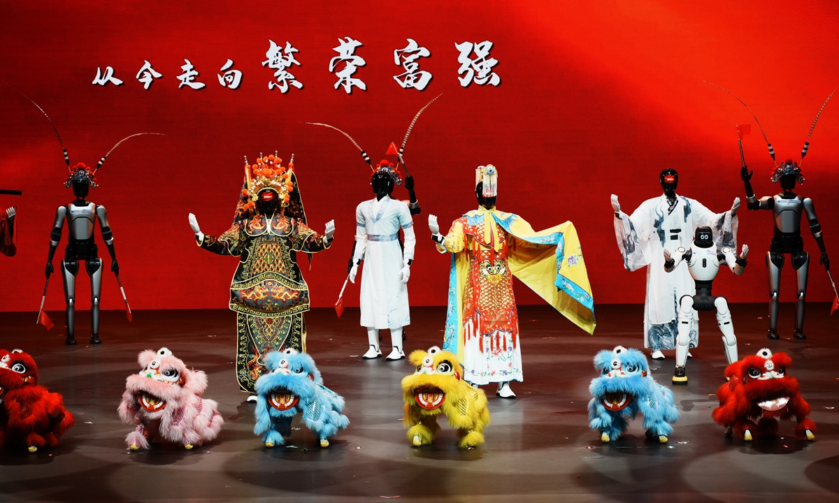Humanoid robots, dressed as Chinese drama characters, perform the song