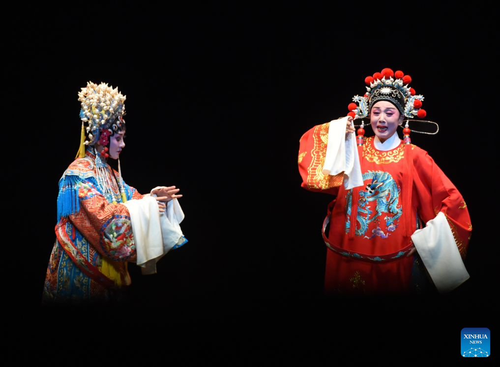 Chinese Huangmei Opera artist Han Zaifen (R) performs in Vienna, Austria, Oct. 15, 2026. (Xinhua/He Canling)