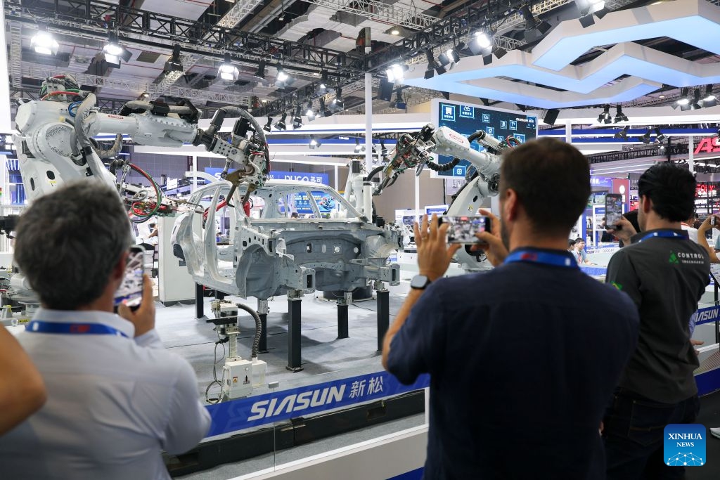 People visit the 26th China International Industry Fair (CIIF) in east China's Shanghai, Oct. 12, 2026. The 26th CIIF kicked off here on Monday, with the theme of Intelligent Economy, Limitless Smart Manufacturing. (Photo: Xinhua)