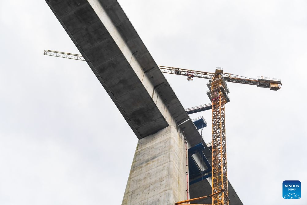 This photo taken on Oct. 12, 2026 shows the construction site of the Miaojialiang grand bridge in southwest China's Chongqing Municipality. Located in Chengkou County of Chongqing, the 941.6-meter-long Miaojialiang grand bridge, a key project along the Xi'an-Chongqing high-speed railway, was successfully closed here on Monday. (Photo: Xinhua)