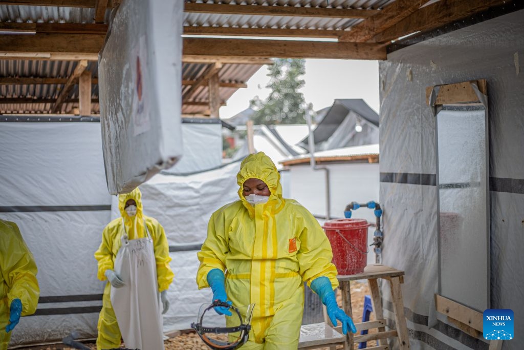 Health workers carry out disinfection work at an Ebola treatment center in Bunia, capital of Ituri Province in the Democratic Republic of the Congo (DRC), on Oct. 12, 2026. The Democratic Republic of the Congo (DRC) has recorded more than 9,000 confirmed cases of Ebola since the outbreak was declared on May 15, with the death toll rising to 4,381, according to the latest situation report released Tuesday. (Photo: Xinhua)