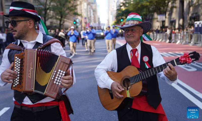 Folk musicians perform during the Columbus Day parade on Manhattan's Fifth Avenue in New York, the United States, Oct. 12, 2026. The Columbus Day, which marks the landing of the Italian-born explorer Christopher Columbus, was held here on Monday. (Photo: Xinhua)