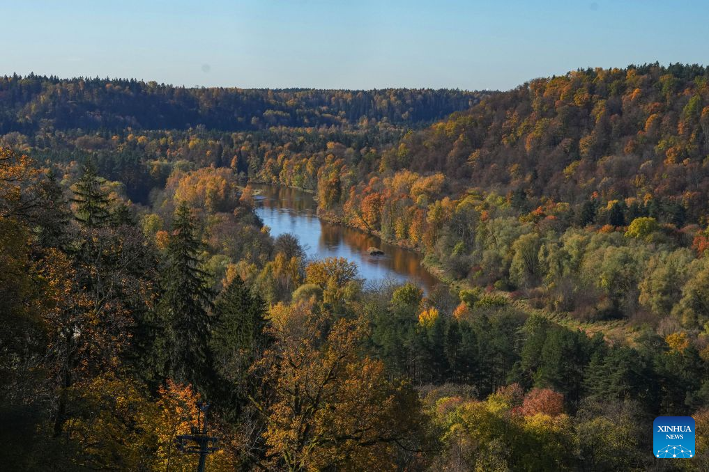 Photo taken on Oct. 19, 2026 shows the autumn scenery in Sigulda, Latvia. (Photo by Edijs Palens/Xinhua)
