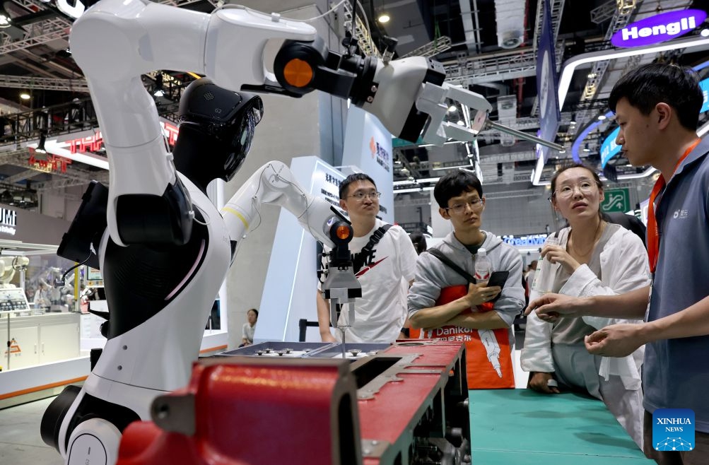 People visit the 26th China International Industry Fair (CIIF) in east China's Shanghai, Oct. 12, 2026. The 26th CIIF kicked off here on Monday, with the theme of Intelligent Economy, Limitless Smart Manufacturing. (Photo: Xinhua)