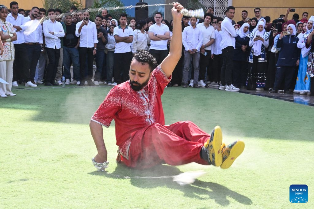 An Egyptian student performs martial arts during a Chinese culture festival at Badr University in Cairo, Egypt, Oct. 12, 2026. A Chinese culture festival was held Monday at Badr University in Cairo to celebrate the 70th anniversary of the establishment of diplomatic relations between China and Egypt, featuring cultural performances, traditional Chinese arts and student exchanges. (Photo: Xinhua)