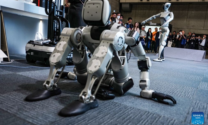This photo taken on Oct. 13, 2026 shows humanoid robots at the Combined Exhibition of Advanced Technologies (CEATEC) 2026 in Chiba Prefecture, Japan. The CEATEC 2026 kicked off here on Tuesday. (Photo: Xinhua)