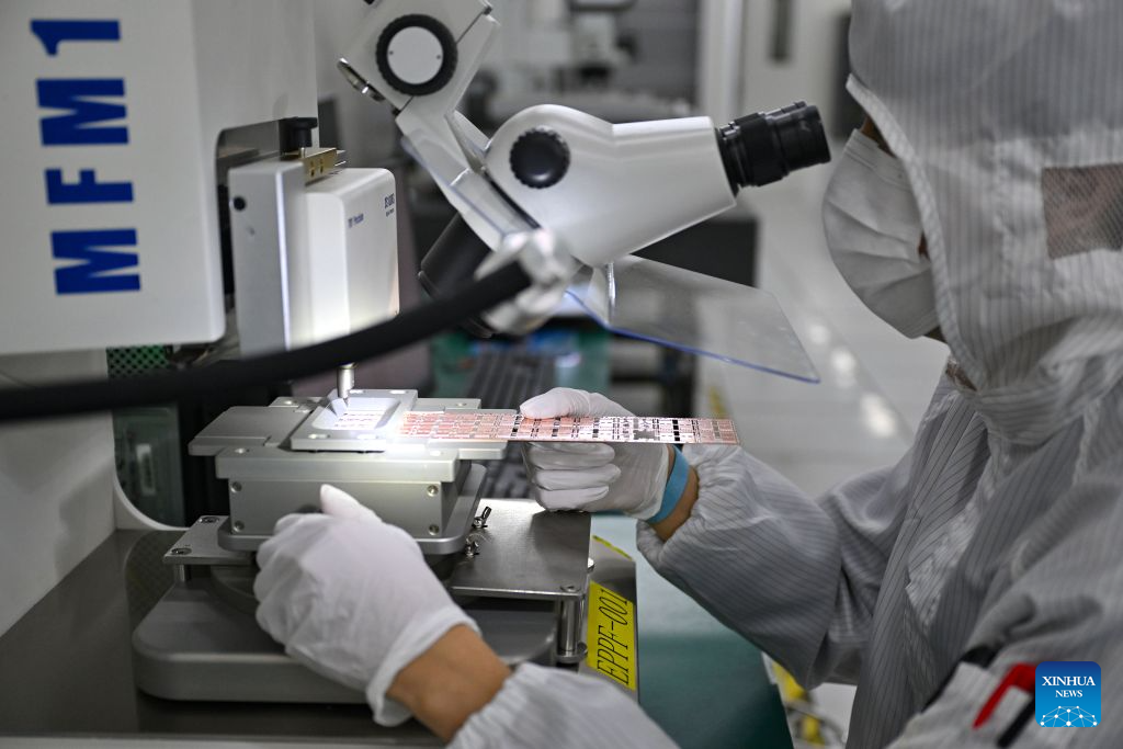 A staff member tests chips at a workshop in Hainan Hangxin High-Tech Industrial Park in Haikou, south China's Hainan Province, Oct. 18, 2026.

Leveraging policy benefits and incentives, the Hainan Free Trade Port, under the island-wide special customs operations, is committed to building itself into a hub for Chinese semiconductors and chips to go global. (Xinhua/Guo Cheng)