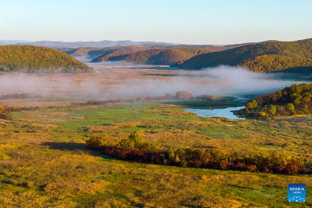 An aerial drone photo taken on Oct. 7, 2026 shows the autumn scenery at the Jingpohu Global Geopark in Mudanjiang City, northeast China's Heilongjiang Province. (Photo by Wang Baoxun/Xinhua)
