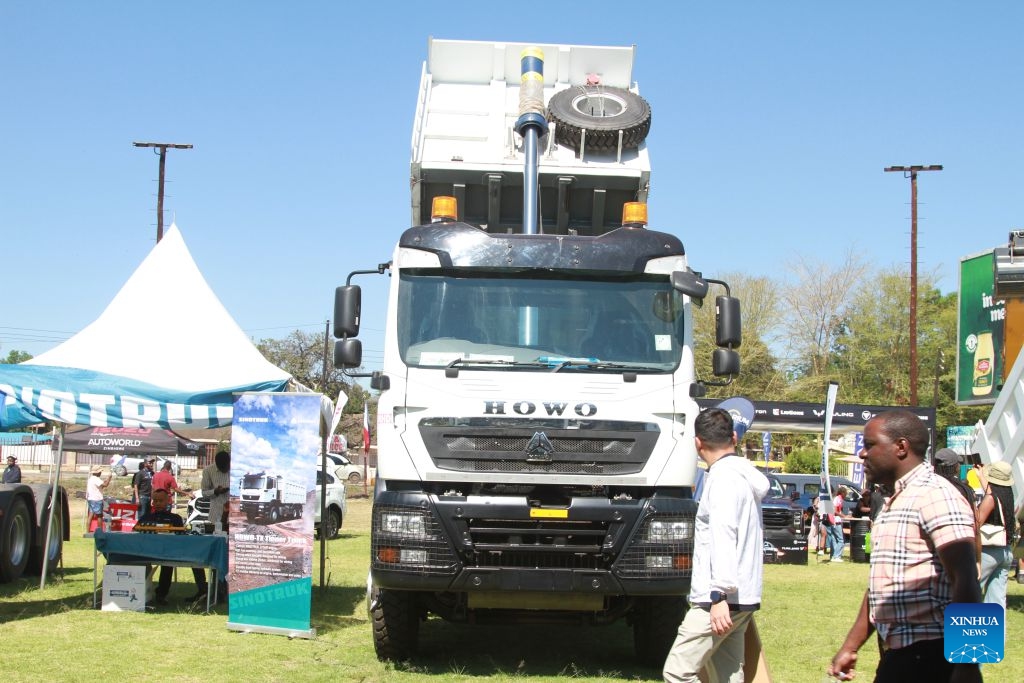 A truck is displayed at the China-Zimbabwe Commodity Expo and Job Fair in Harare, Zimbabwe, on Oct. 11, 2026. Chinese heavy-duty truck brands attracted strong interest from visitors at the three-day China-Zimbabwe Commodity Expo and Job Fair, which concluded Sunday in the Zimbabwean capital of Harare, reflecting growing local demand for reliable commercial vehicles. (Photo: Xinhua)