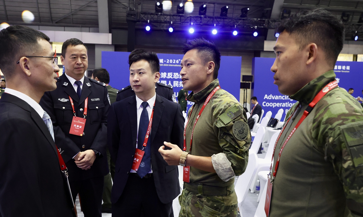 
Delegates from Hong Kong Special Administrative Region interact with other participants on the sidelines of the 2026 Great Wall International Forum on Counter-terrorism. The forum opened in Beijing on October 13, 2026. Photo: CNS Photo