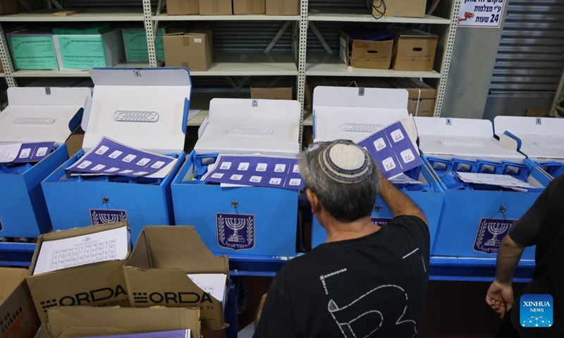 A worker prepares ballot boxes at a logistics center near the central Israeli city of Modiin, Oct. 14, 2026. The general elections for Israel's Knesset, the country's parliament, will be held on Oct. 27. All the preparations for the election are underway. (Photo: Xinhua)