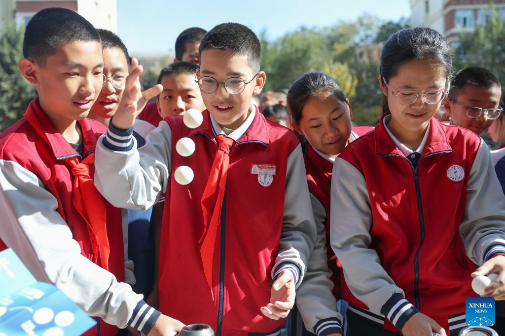 Students attend a science and technology festival at a middle school in Urumqi, northwest China's Xinjiang Uygur Autonomous Region, Oct. 14, 2026. (Photo: Xinhua)