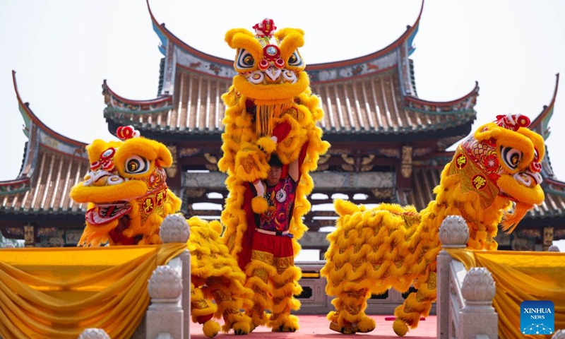 Actors perform lion dance during the opening ceremony of the 19th A-Ma Cultural and Tourism Festival in Macao, south China, Oct. 13, 2026. A statue of Mazu, a Chinese sea goddess, was paraded through the streets of China's Macao Special Administrative Region (SAR) on Tuesday as the 19th A-Ma Cultural and Tourism Festival opened. (Photo: Xinhua)