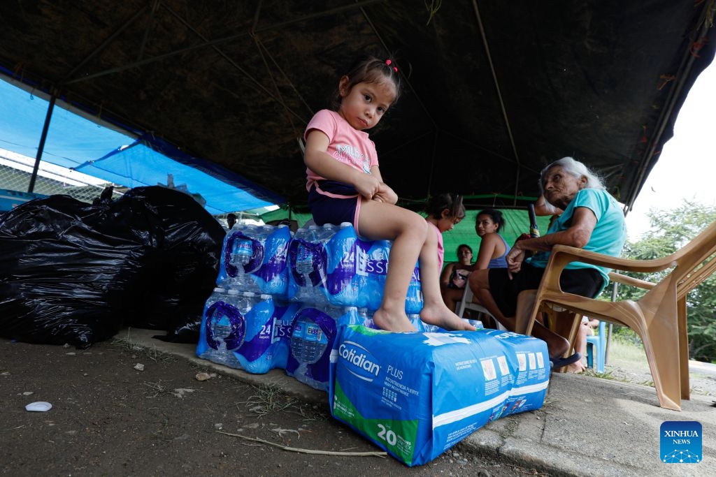 This photo taken on Oct. 13, 2026 shows quake-affected residents at a temporary shelter in Llana Arriba, Herrera, Panama. (Photo: Xinhua)