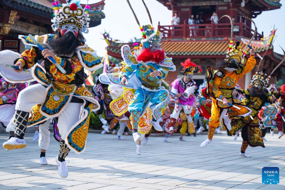 Actors perform during the opening ceremony of the 19th A-Ma Cultural and Tourism Festival in Macao, south China, Oct. 13, 2026. A statue of Mazu, a Chinese sea goddess, was paraded through the streets of China's Macao Special Administrative Region (SAR) on Tuesday as the 19th A-Ma Cultural and Tourism Festival opened. The opening ceremony at A-Ma Cultural Village was followed by traditional rites honoring the goddess, with the procession taking place in the afternoon. (Photo: Xinhua)