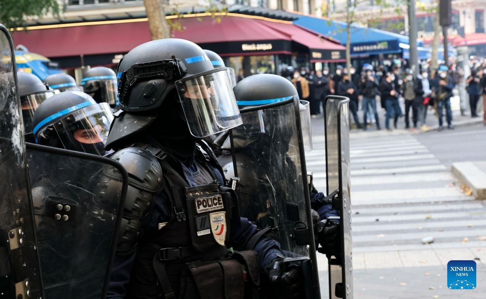 Law enforcement officers are seen during a protest in Paris, France, Oct. 17, 2026. French Interior Minister Laurent Nunez said Saturday that about 550,000 people took part in the protests across France. According to French media reports, the demonstrations brought together farmers, climate activists, trade unions and students, expressing demands on fuel prices, the cost of living, education and public services. (Photo: Xinhua)