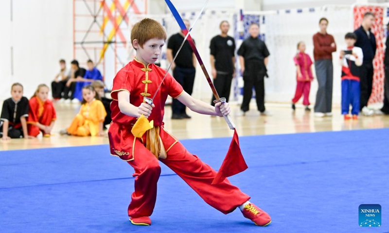 Roman Nikitin competes during the Wushu apparatus event at Legends of Kung Fu 2026 International Chinese Martial Arts Festival in Moscow, Russia, on Oct. 17, 2026. (Photo by Alexander Zemlianichenko Jr/Xinhua)