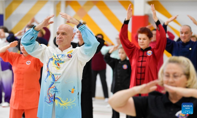 Participants compete during the Health Qigong event at Legends of Kung Fu 2026 International Chinese Martial Arts Festival in Moscow, Russia, on Oct. 17, 2026. (Photo by Alexander Zemlianichenko Jr/Xinhua)