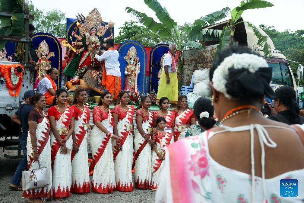 Devotees celebrate during the Durga Puja, one of the largest Hindu festivals, in Yangon, Myanmar, Oct. 20, 2026. (Photo: Xinhua)