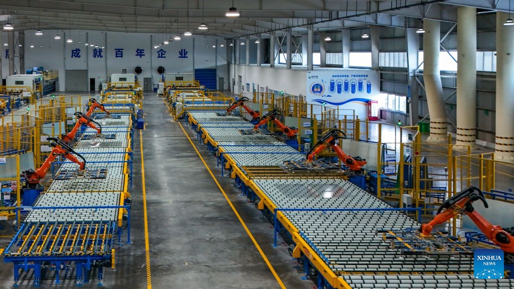 A drone photo taken on Oct. 19, 2026 shows a view in the workshop of Zhaotong Kibing Photovoltaic Technology Co,. Ltd. in Zhaotong City, southwest China's Yunnan Province. Leveraging its advantages in rich resources of silicon ore and the development of green electricity, Zhaotong City has attracted leading enterprises to develop the photovoltaic glass manufacturing industry, bringing about employment for surrounding residents. Currently, the city has basically formed an industrial chain from silicon mining and washing to the manufacturing of photovoltaic glass and photovoltaic modules. (Photo: Xinhua)