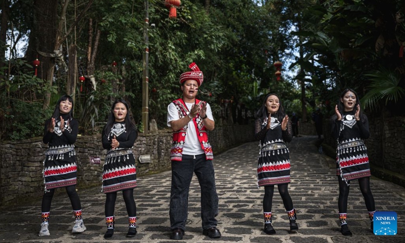Artists perform ethnic dance in Simola Wa Village in Qingshui Town of Tengchong City, southwest China's Yunnan Province, Oct. 19, 2026. The Simola Wa Village has a history of over 500 years and is home to people of multiple ethnic groups including the Wa, Han, Bai and Dai. Simola means a place of happiness in the Wa language. In recent years, the village has relied on its ethnic cultural resources to create a distinctive cultural tourism industry, attracting a continuous stream of tourists. (Photo: Xinhua)