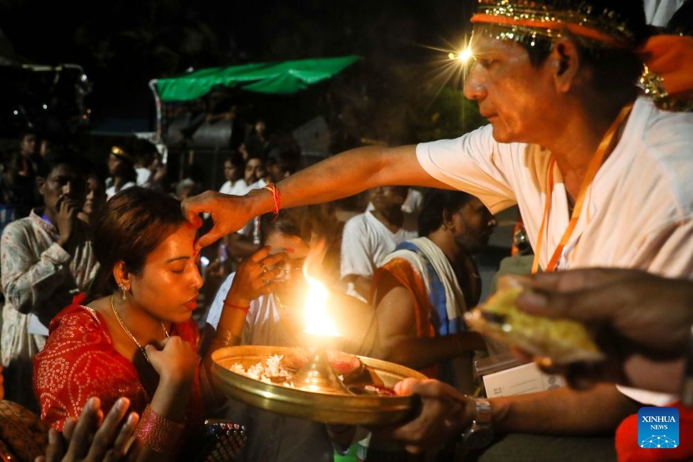Devotees celebrate during the Durga Puja, one of the largest Hindu festivals, in Yangon, Myanmar, Oct. 20, 2026. (Photo: Xinhua)