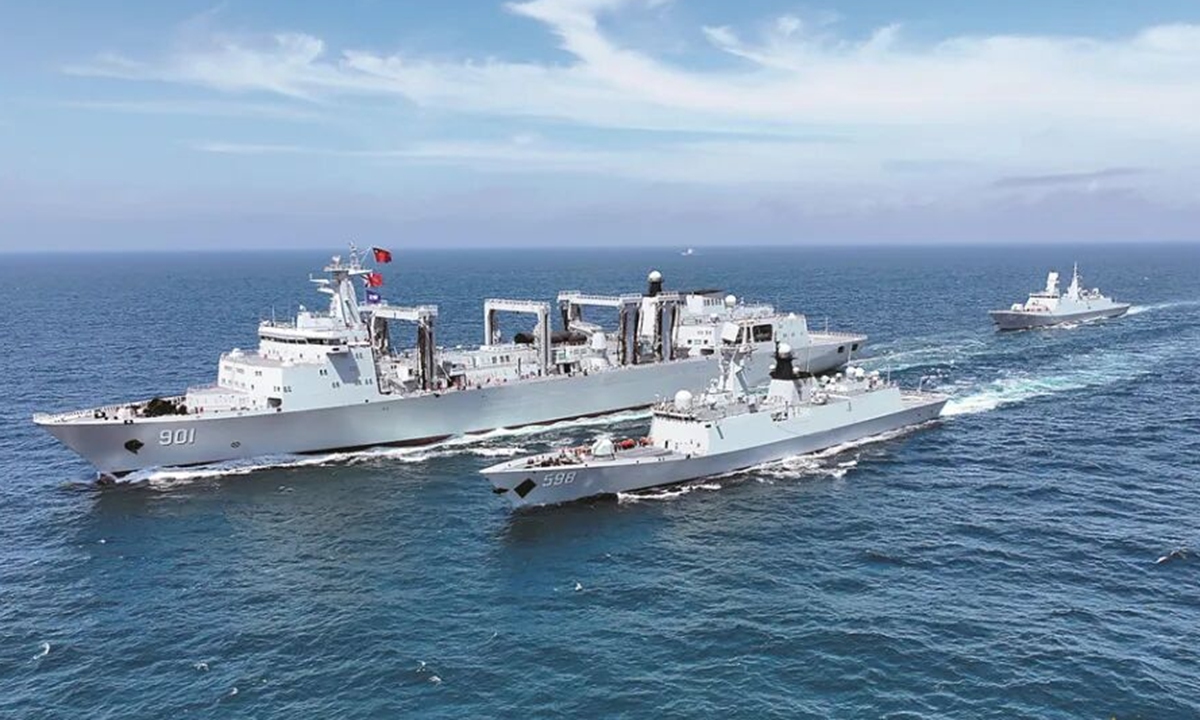The Type 901 sea-going comprehensive replenishment ship Hulunhu (Hull 901) conducts an underway replenishment drill. Photo: China Military Online