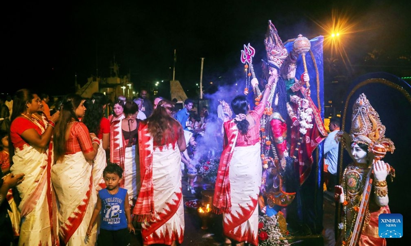 Devotees celebrate during the Durga Puja, one of the largest Hindu festivals, in Yangon, Myanmar, Oct. 20, 2026. (Photo: Xinhua)