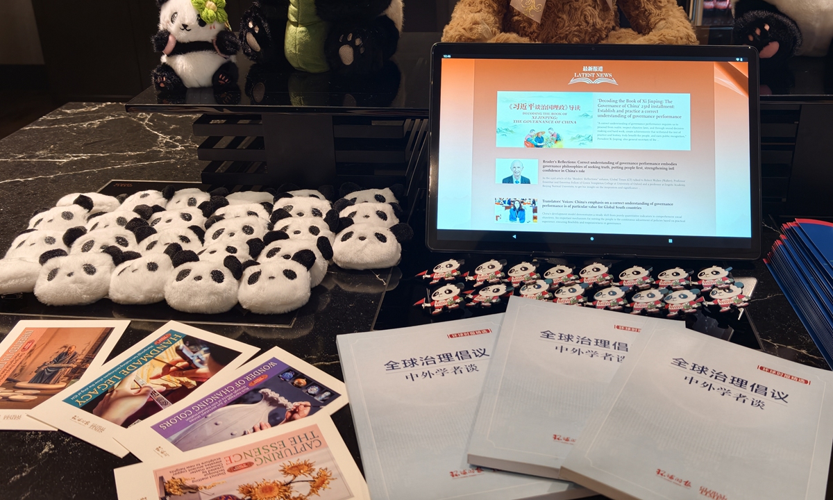Creative cultural products and multimedia reports by the Global Times on display at the exhibition Photo: Hu Yuwei/GT