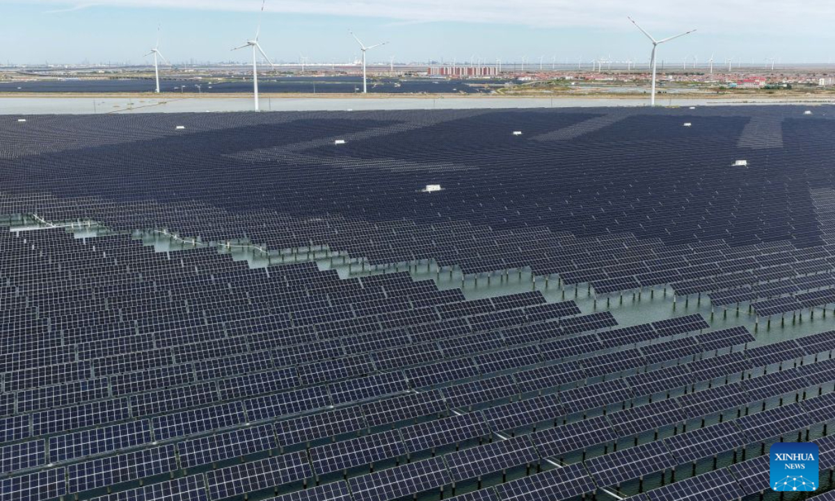 A drone photo taken on Sept. 9, 2026 shows an integrated fishery and photovoltaic project in Huanghua City, north China's Hebei Province. By the end of September 2026, China's cumulative installed capacity of wind and solar power reached 2.01 billion kilowatts, the country's National Energy Administration announced on Monday. Of the total, solar power capacity stood at 1.31 billion kilowatts, up 16.5 percent year on year, while wind power capacity reached 700 million kilowatts, up 20.4 percent. (Xinhua/Yang Shiyao)
