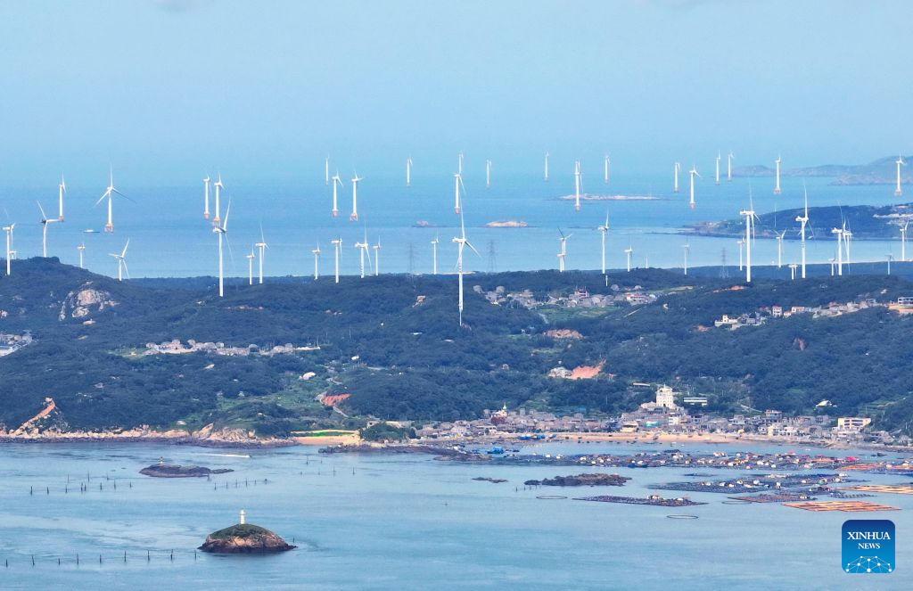 A drone photo taken on June 30, 2026 shows offshore and onshore wind farms in Pingtan, southeast China's Fujian Province. By the end of September 2026, China's cumulative installed capacity of wind and solar power reached 2.01 billion kilowatts, the country's National Energy Administration announced on Monday. Of the total, solar power capacity stood at 1.31 billion kilowatts, up 16.5 percent year on year, while wind power capacity reached 700 million kilowatts, up 20.4 percent. (Xinhua/Lin Shanchuan)