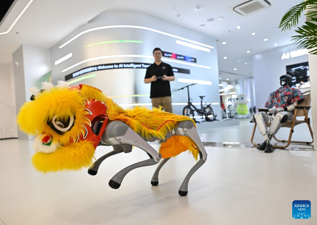 A staff member manipulates a robotic dog at the AI Intelligent Terminal Consumption Center in the Nanjing AI Agent Distribution Center in Nanjing, east China's Jiangsu Province, Oct. 26, 2026.
The Nanjing AI Agent Distribution Center is an integrated platform for the display and supply-demand matching of AI applications and technologies. (Xinhua/Ji Chunpeng)