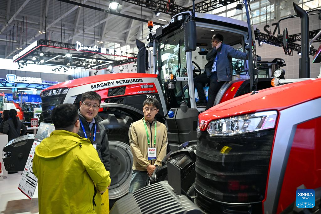 Visitors learn about products during the China International Agricultural Machinery Exhibition (CIAME) 2026 at the National Convention and Exhibition Center (Tianjin) in Tianjin, north China, Oct. 26, 2026. With an area of nearly 300,000 square meters, the three-day exhibition kicked off here on Monday, bringing together over 3,000 enterprises from home and aboard. (Xinhua/Sun Fanyue)