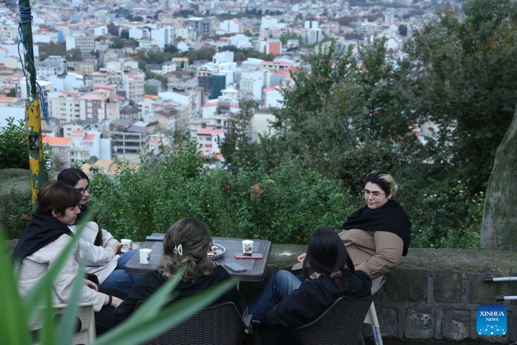 People enjoy their leisure time at a viewing platform in Lahijan, Iran, Oct. 20, 2026. (Xinhua/Shadati)