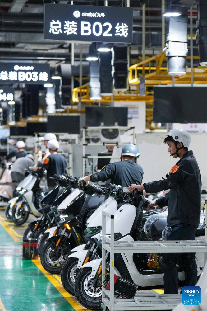 Workers check vehicles on the final assembly line at a smart electric two-wheeler company in Changzhou, east China's Jiangsu Province, Oct. 14, 2026.
In recent years, Changzhou City has leveraged its traditional strengths in manufacturing to accelerate the clustering of electric two-wheeler manufacturers and their component suppliers, aiming at development of more smart and high-end products.
The city now accounts for about 10 percent of China's output of electric two-wheelers and has established a complete industrial chain spanning from parts to general assembly.
Changzhou has also actively reinforced the technological innovation as the main driver of the industry, as local makers keep boosting R&D efforts to further improve their products. (Xinhua/Li Bo)