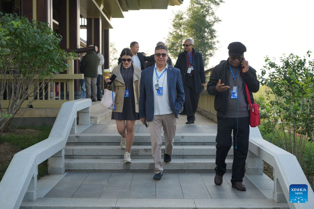 Participants of the 2026 Global Governance Forum (Xiong'an) visit the construction site of the start-up zone of Xiong'an New Area in north China's Hebei Province, Oct. 23, 2026. The 2026 Global Governance Forum (Xiong'an) kicked off here on Friday and will last till Sunday. Participants from various countries and regions visited a smart-city science and innovation center and the construction site of the start-up zone of Xiong'an New Area ahead of the forum. (Xinhua/Su Kaiyang)