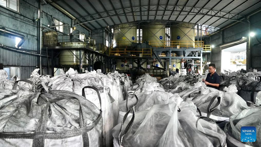 Workers count pure bamboo-based activated carbon material in the workshop of a new material technology company in Shangyou County, east China's Jiangxi Province, Oct. 26, 2026. Shangyou County in east China's Jiangxi is a major bamboo-producing area. In recent years, its industrial chain has expanded into high-value-added fields such as bamboo building, bamboo fiber, and bamboo charcoal.
As of December 2025, the county's bamboo industry had a total output value of 883 million yuan (about 131.5 million U.S. dollars), with products exported to over 30 countries and regions. (Xinhua/Hu Chenhuan)